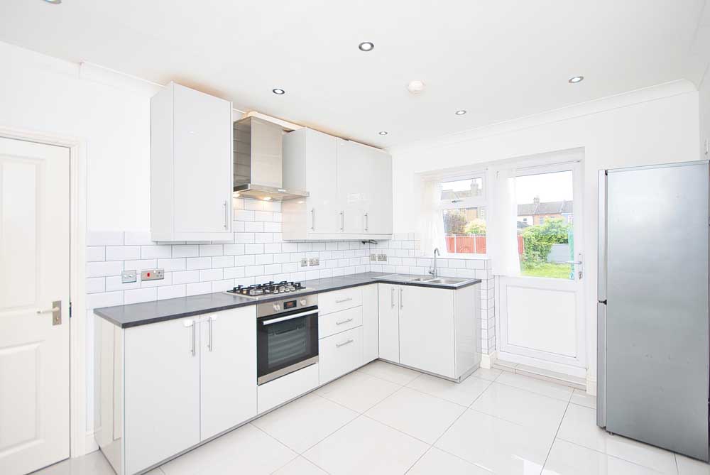 Modern L-Shaped Kitchen and Dining Room with tiled flooring